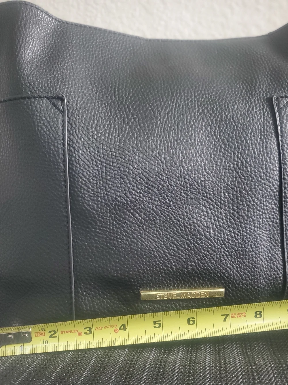 Steve Madden Black Pebbled Leather Crossbody with Gold Logo Plate